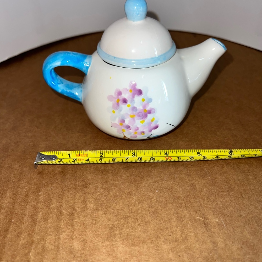 Hand-Painted Mini Teapot with Blue Handle and Floral Accent